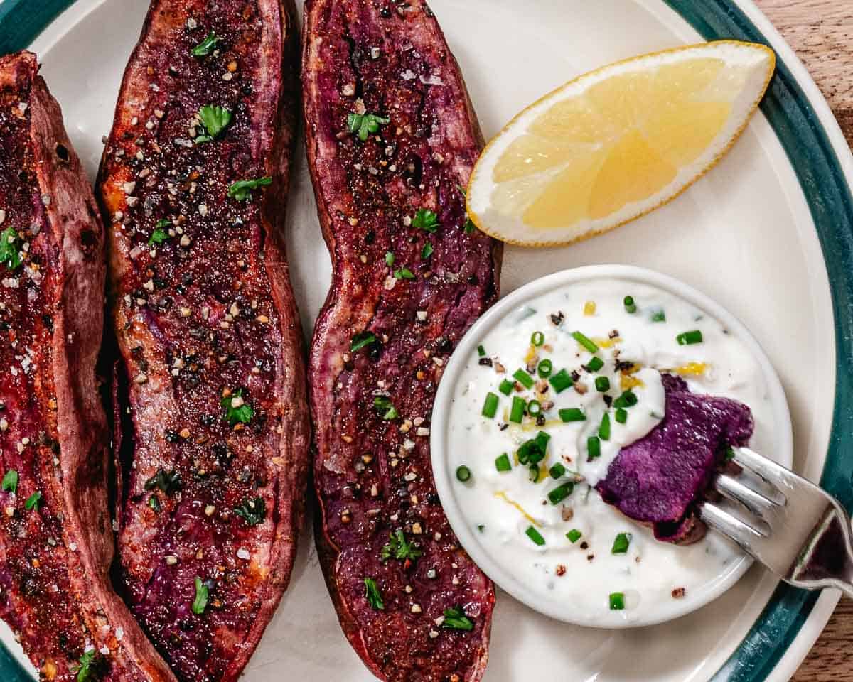 Roasted purple sweet potato dipped in lemon chive sour cream sauce