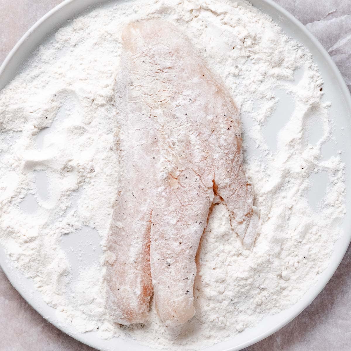 Blackbelly rosefish fillet lightly dredged in flour before pan-frying