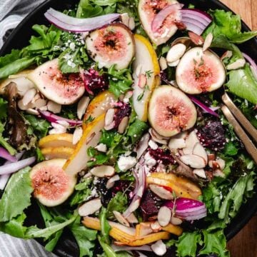Roasted beet and pear salad with figs, feta, almonds, red onion, and mixed greens.