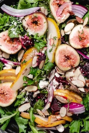 Roasted beet and pear salad with figs, feta, almonds, red onion, and mixed greens.