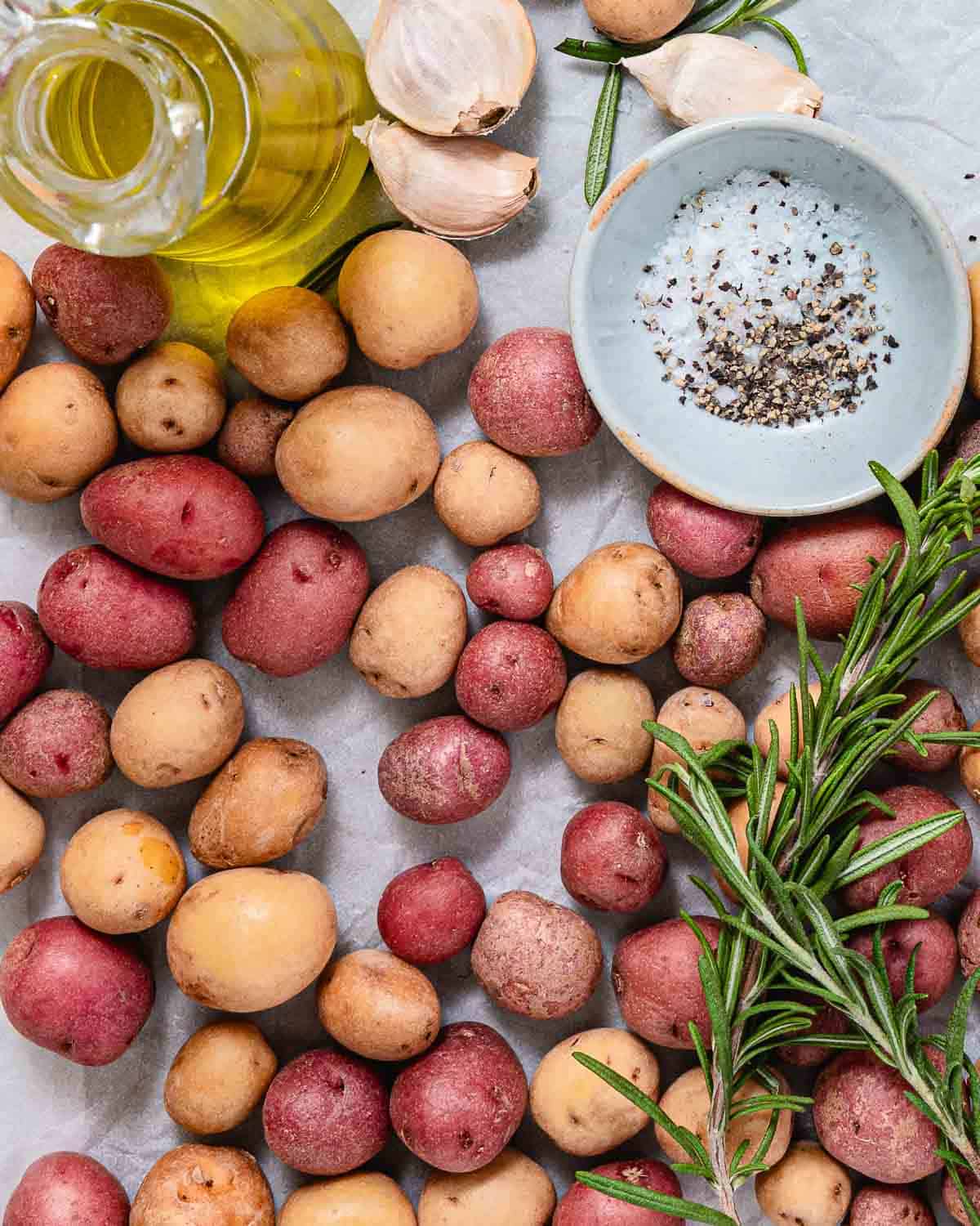 Roasted tiny yellow and red potatoes with garlic, rosemary, olive oil, salt and pepper.