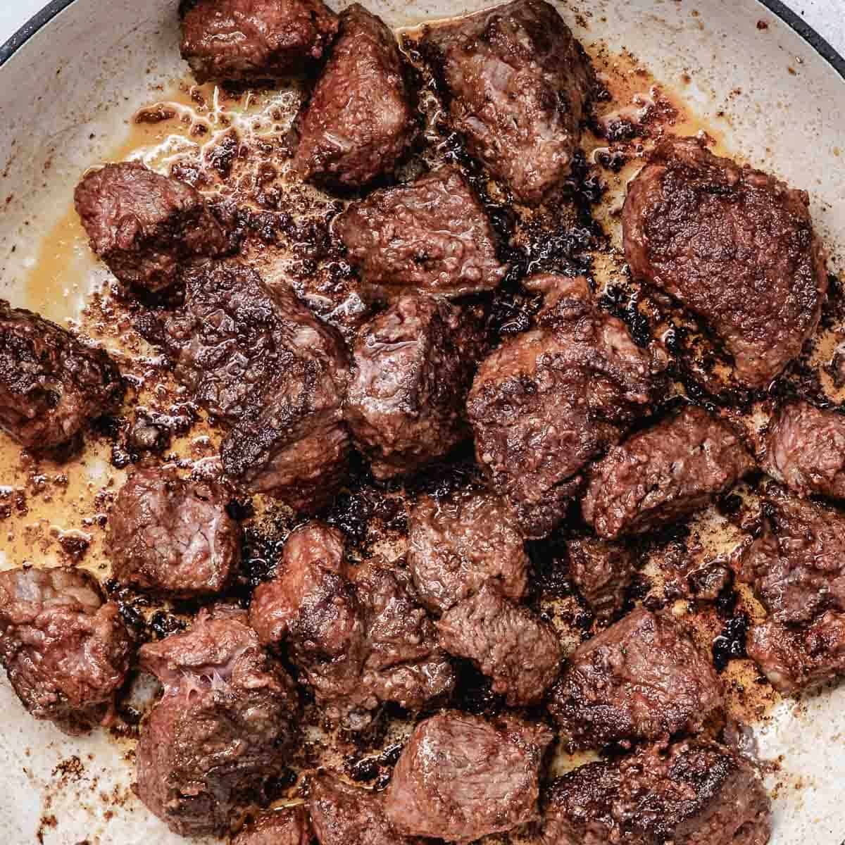 Browned beef in a heavy pot