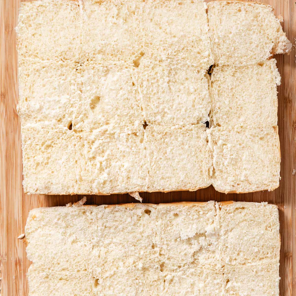 Hawaiian rolls sliced horizontally as one slab.