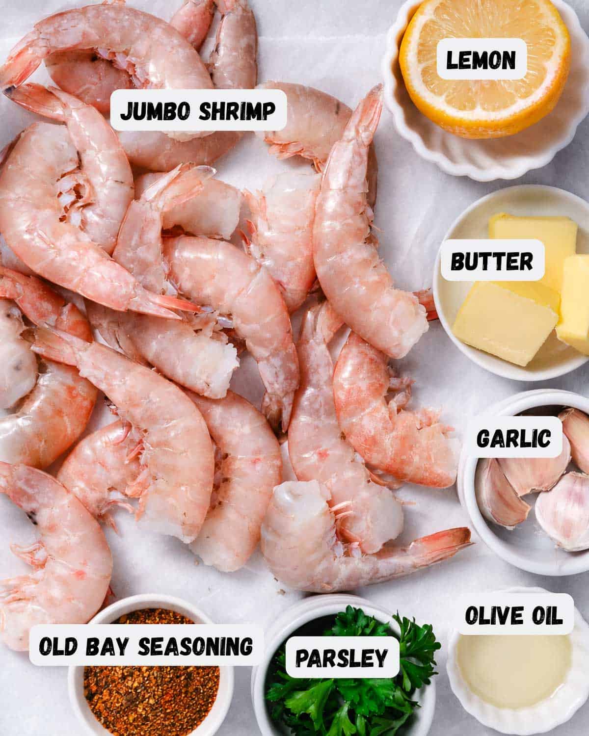 Raw shrimp with Old Bay seasoning, butter, lemon, garlic, fresh parsley, and lemon juice.