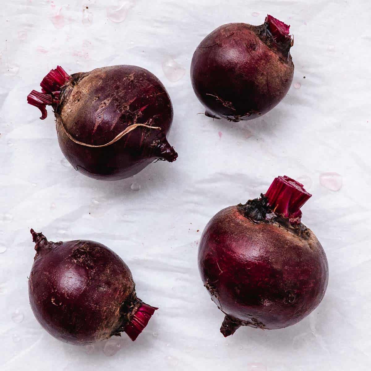 Scrubbed red beets before cooking.